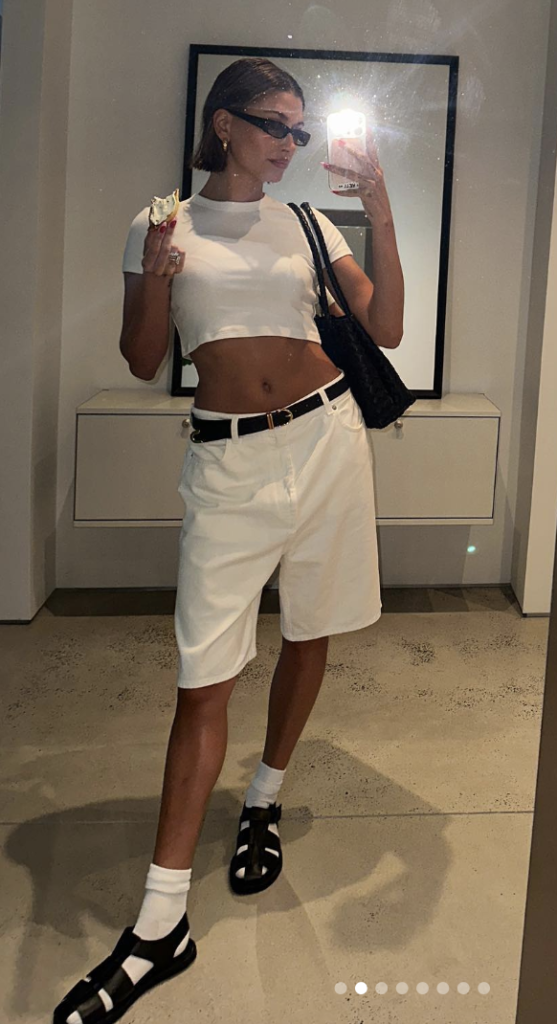 Hailey Baldwin Bieber in White Tee and Shorts
