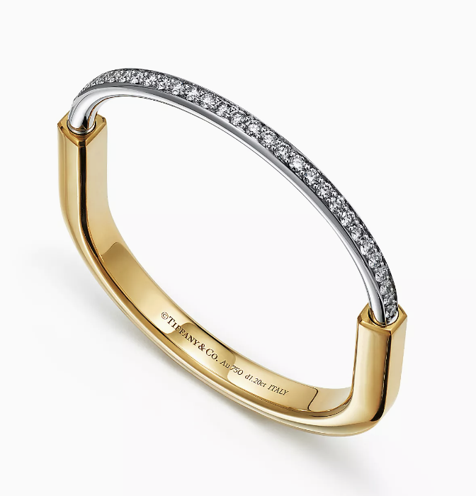 TIFFANY & CO. Tiffany Lock Bangle in Yellow and White Gold with Half Pavé Diamonds